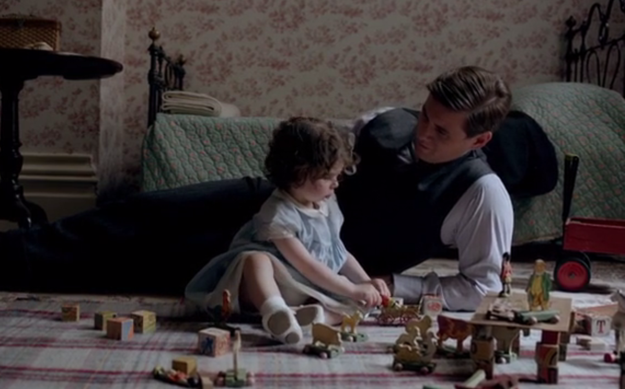 Tom talks to baby Sybbie in the Downton Abbey nursery