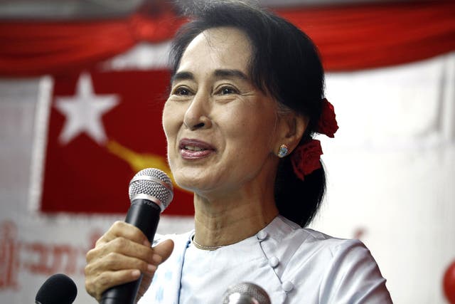 Aung San Suu Kyi delivers a speech at the National League for Democracy (NLD) headquarters in Yangon, last month