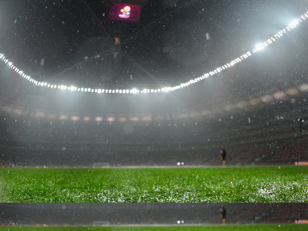 WARSAW, POLAND - OCTOBER 16: General view of the stadium during the rain before the FIFA 2014 World Cup Qualifier between Poland and England at the National Stadium on October 16, 2012 in Warsaw, Poland. (Photo by Michael Regan/Getty Images)