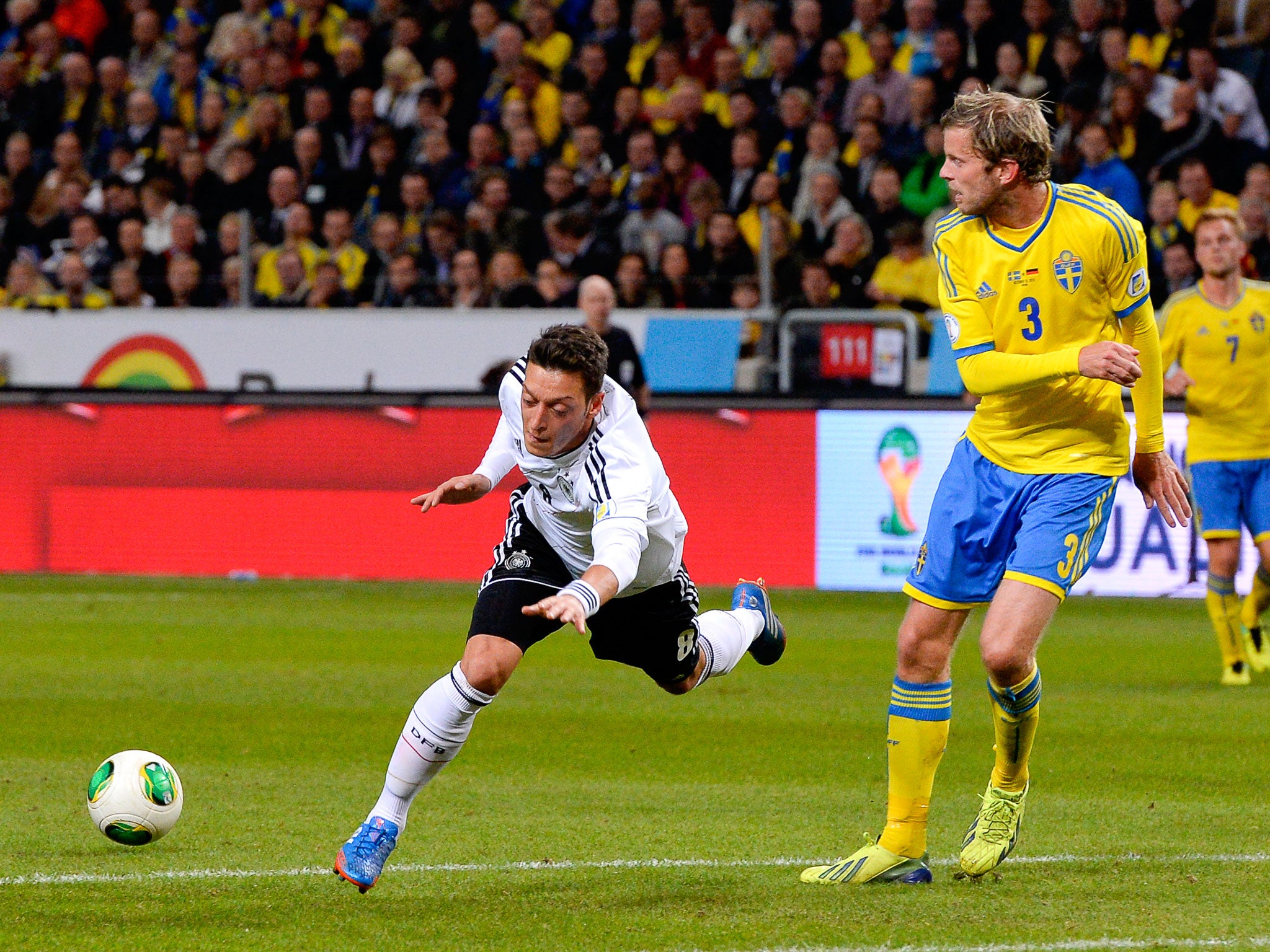Mesut Ozil picked up a knee injury during Germany's 5-3 victory over Sweden