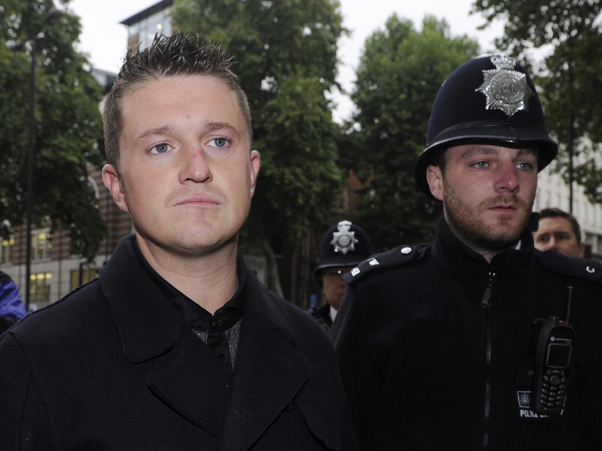 16 October 2013: Former English Defence League leader Tommy Robinson arrives at the City of Westminster Magistrates court in London