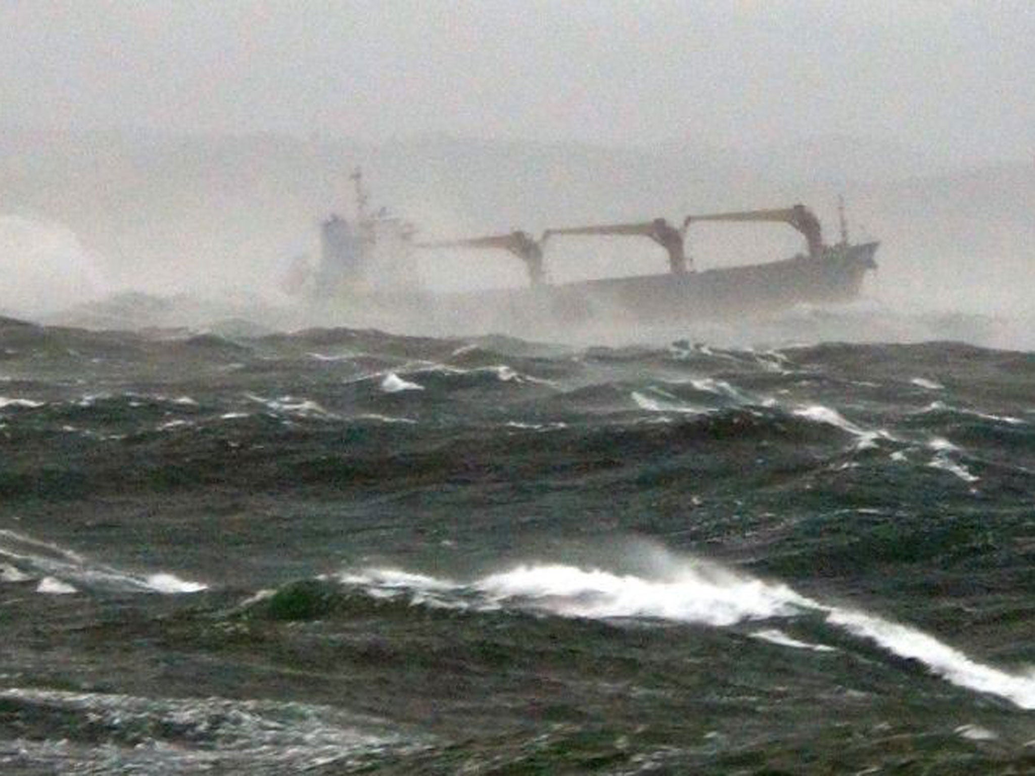 This handout photo taken on 15 October 2013 shows the Chinese ship in a storm off the southeastern South Korean port city of Pohang