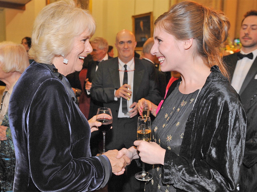 Eleanor Catton with the Duchess of Cornwall after receiving her award