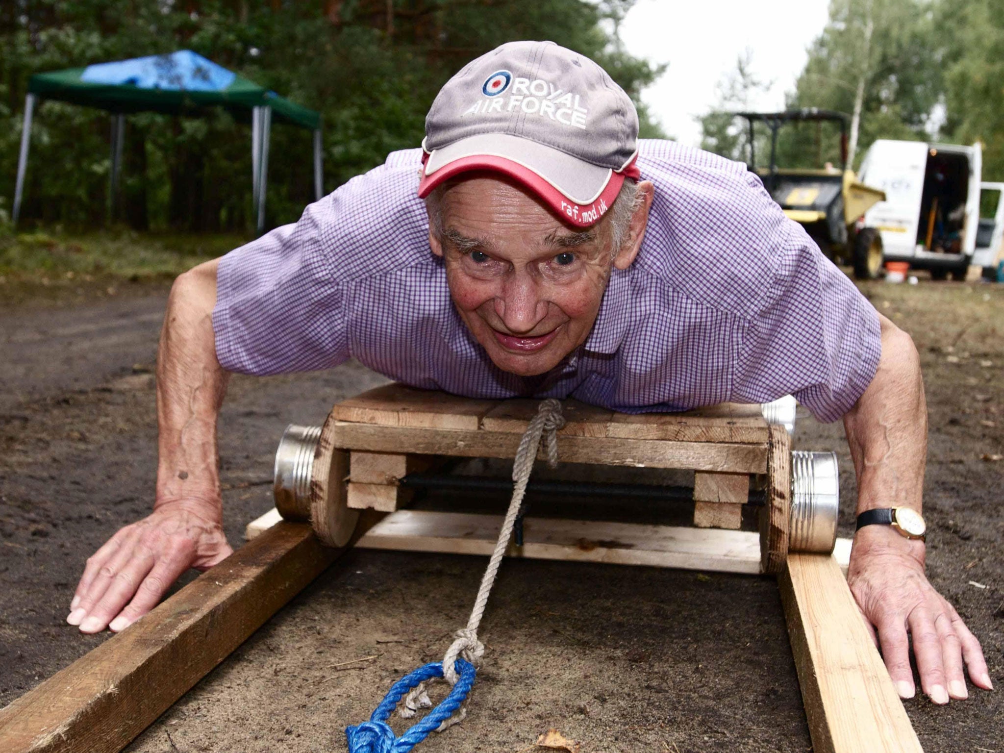 Stone demonstrates a tunnel trolley in 2011 for a television documentary