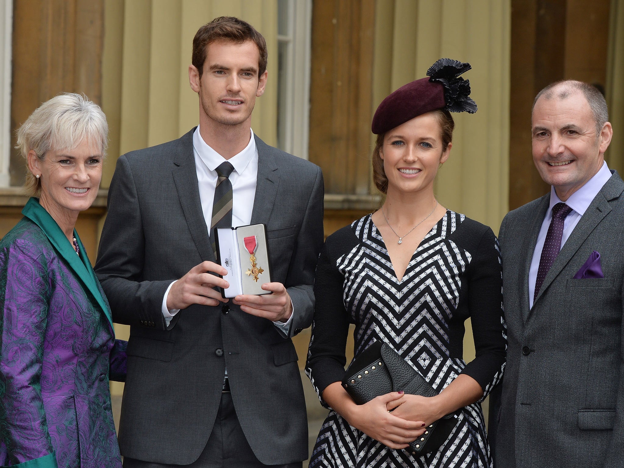Wimbledon champion Andy Murray, his parents Judy and Will and his girlfriend Kim Sears pose at Buckingham Palace