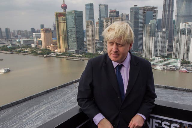 <p>Boris Johnson in Shanghai during a trade mission when he was London mayor in October 2013</p>