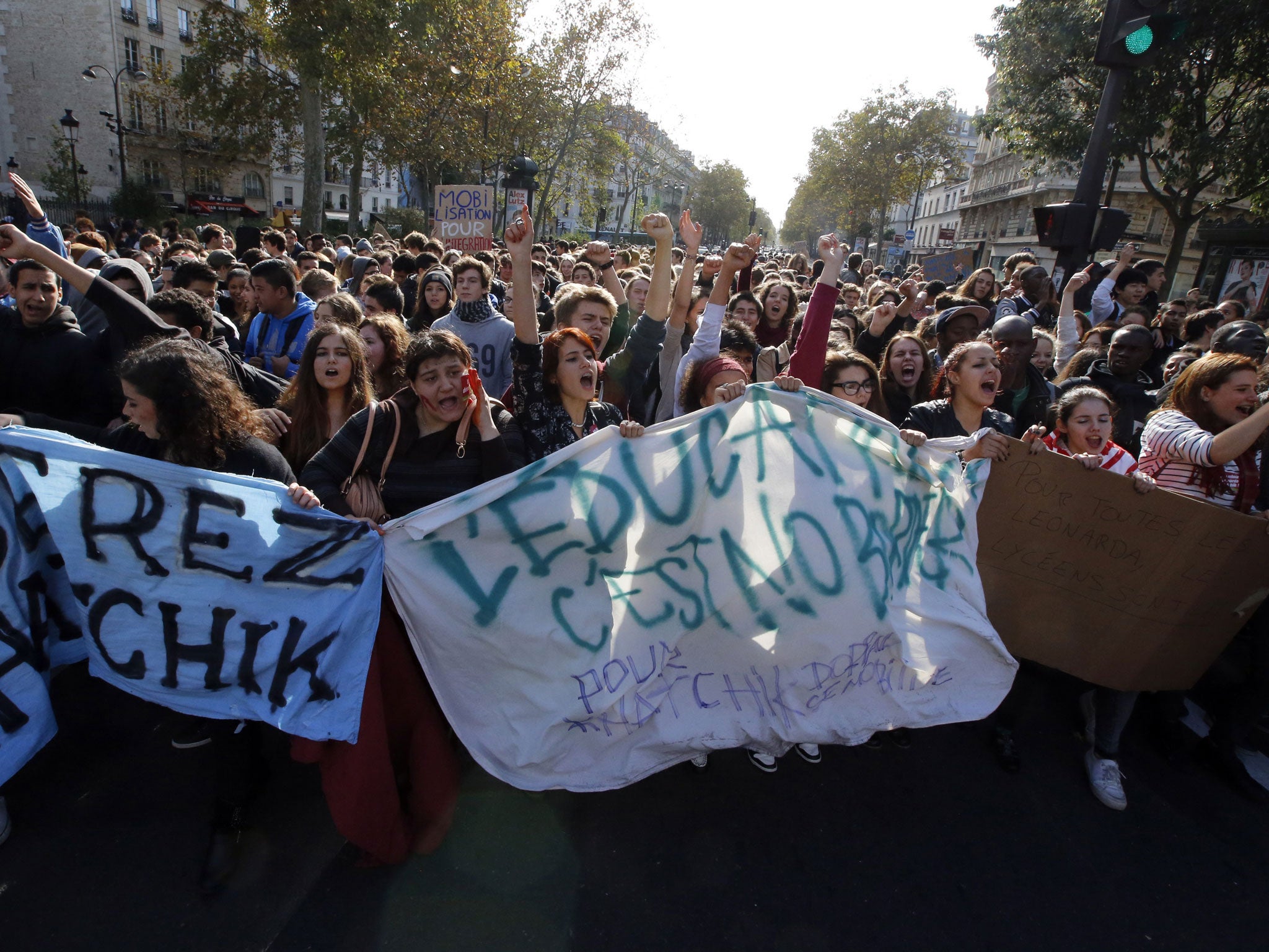 Protesting students of Paris high schools hold a banner reading 'Education must Be Without Borders'