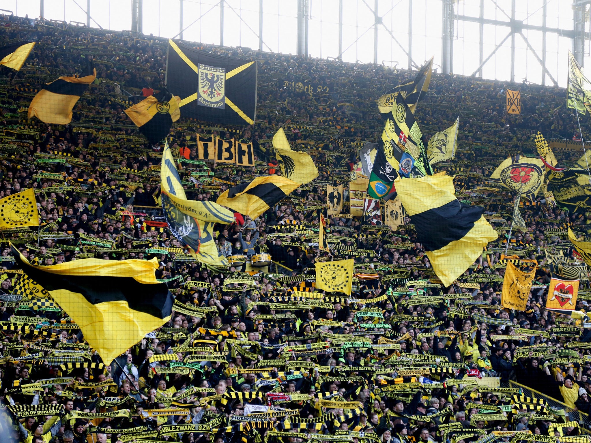 Fans of Borussia Dortmund, like at other German clubs, are allowed to stand