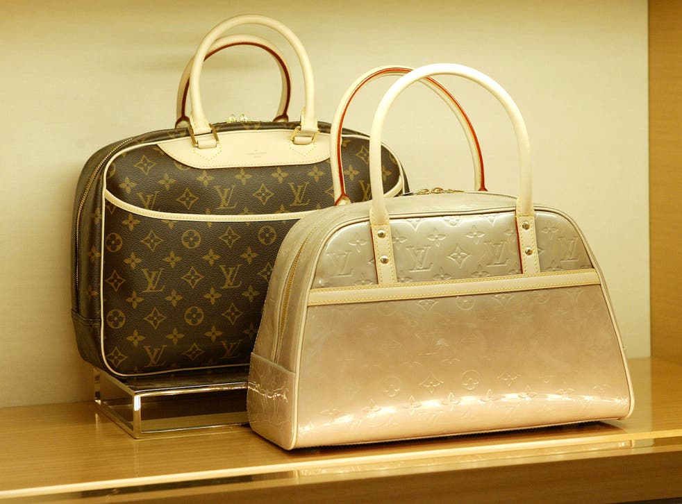 File photo of Louis Vuitton designer handbags: A woman from Swindon, Wiltshire has been jailed for stealing 905 handbags over a three year period