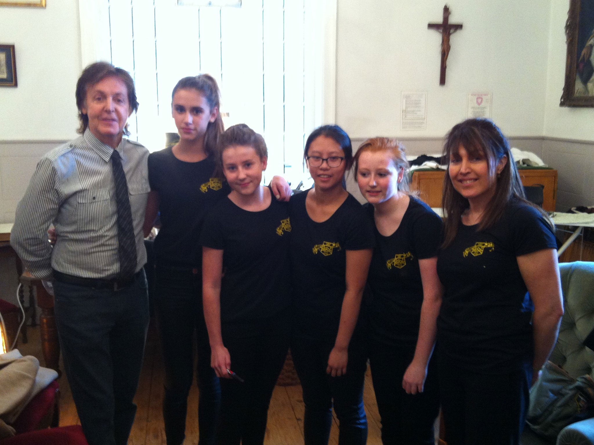 Paul McCartney with Highclare School Choir: Georgia Batchelor, Chloe Andrews, Louise Chung, Billie O'Shea and their teacher Jennie Thornton