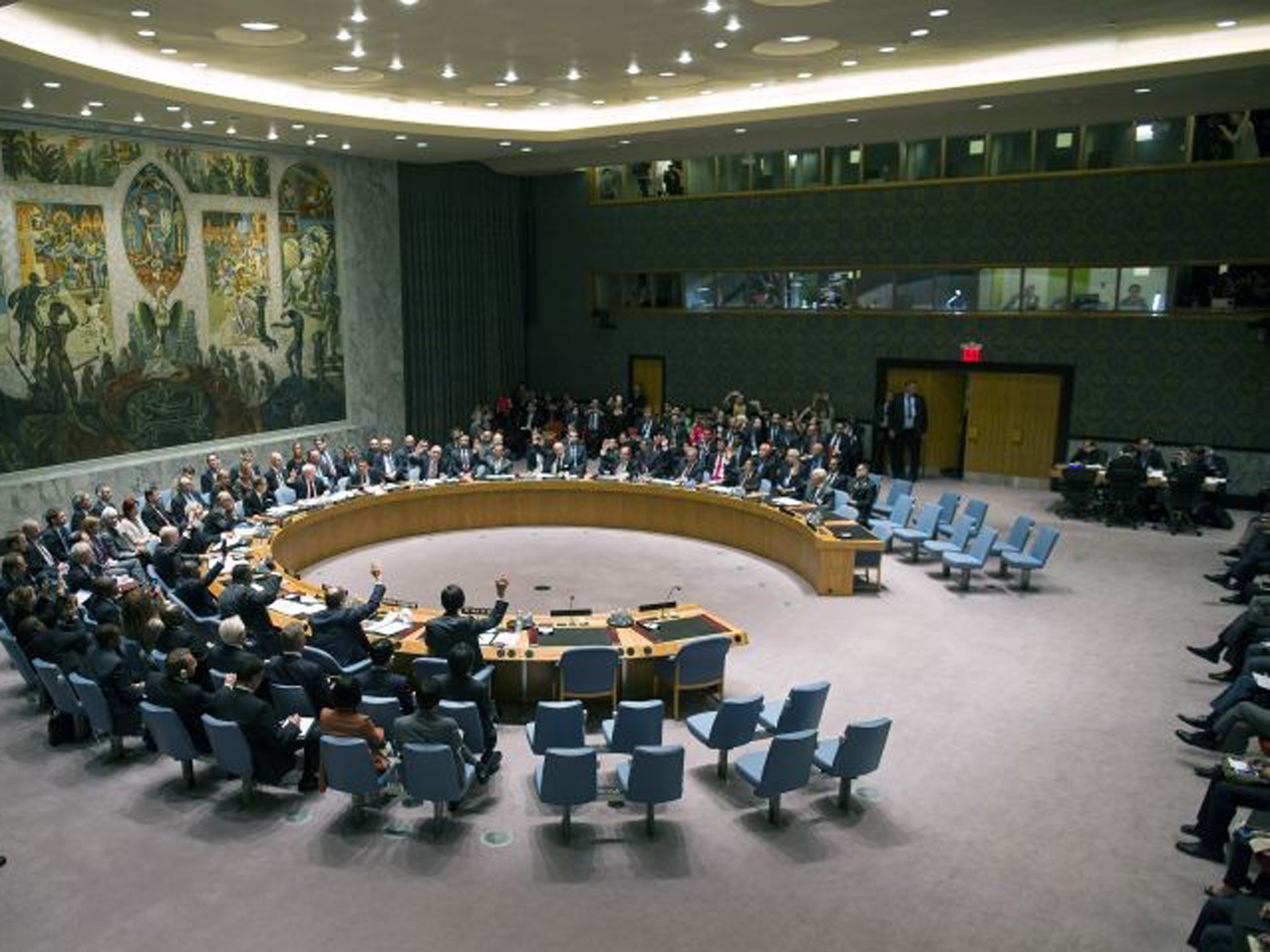 The United Nations Security Council votes on a resolution that will require Syria to give up its chemical weapons