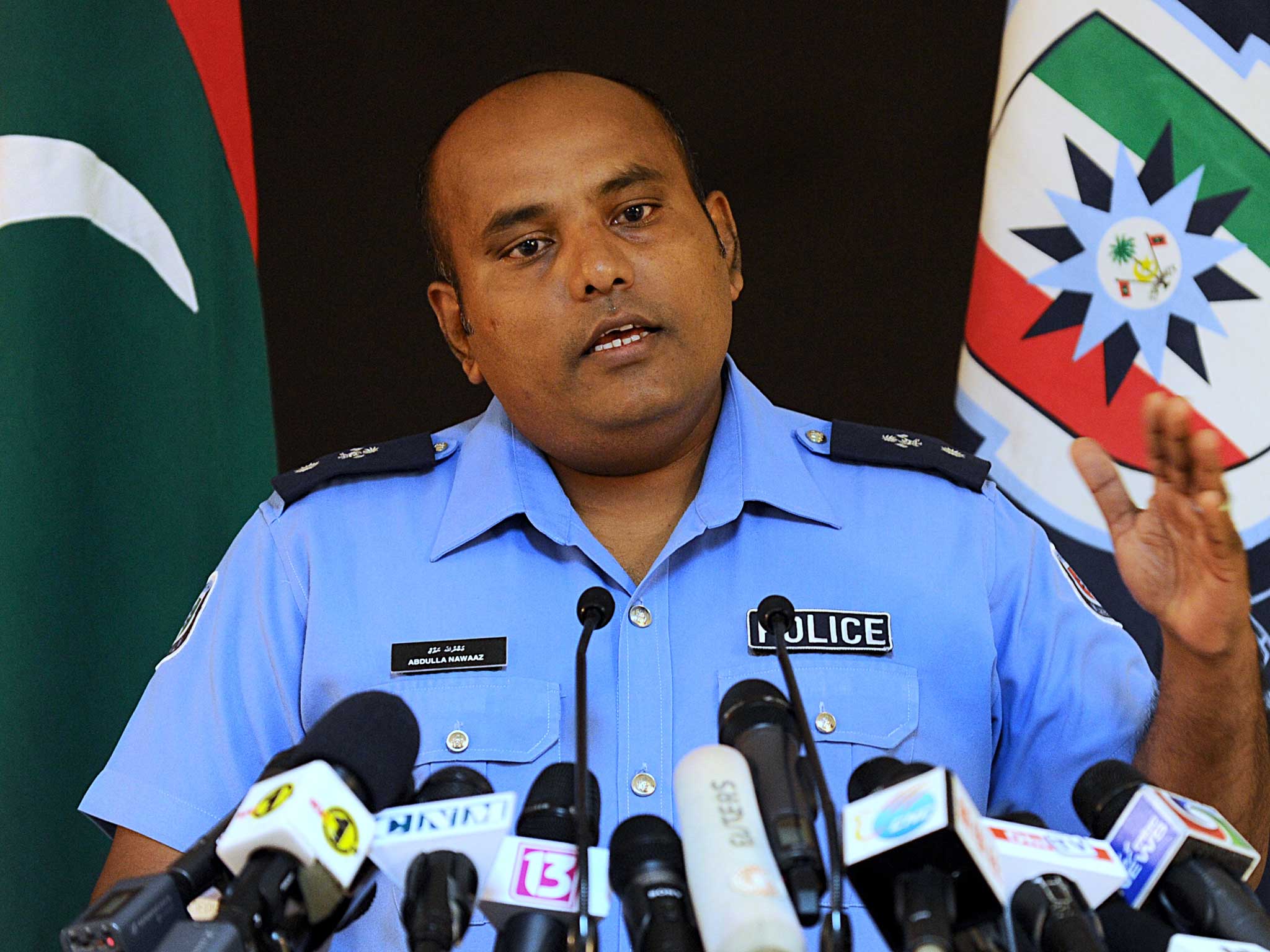 Maldives chief superintendent of police speaks to reporters after police declared presidential vote illegal and blocked documents from leaving the offices of the independent Elections Commission