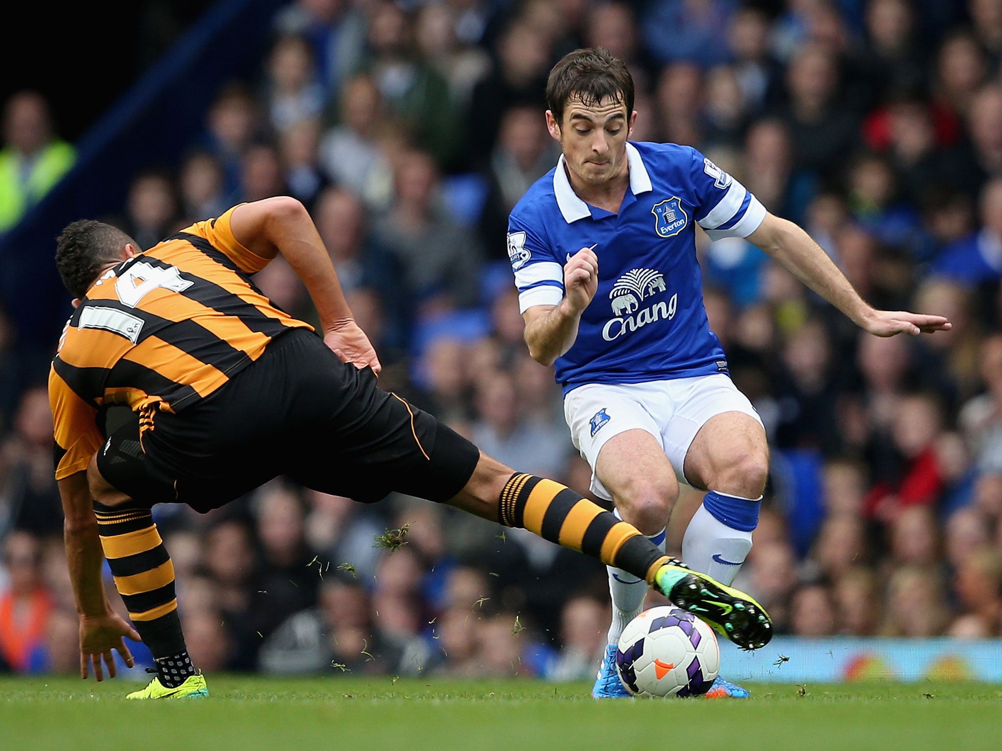 Leighton Baines is tackled by Jake Livermore