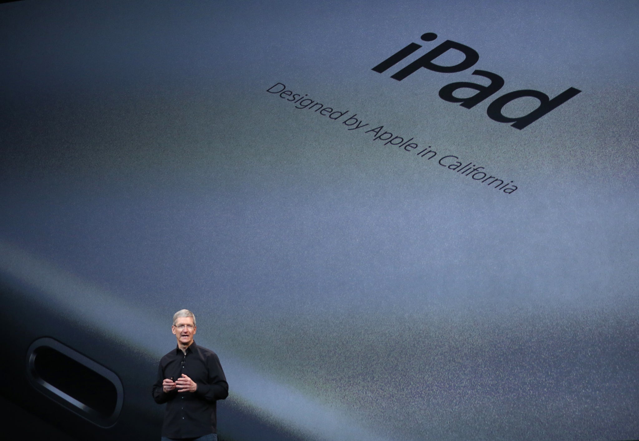 Apple Inc CEO Tim Cook speaks about the new iPad Air during an Apple event in San Francisco, California October 22, 2013.
