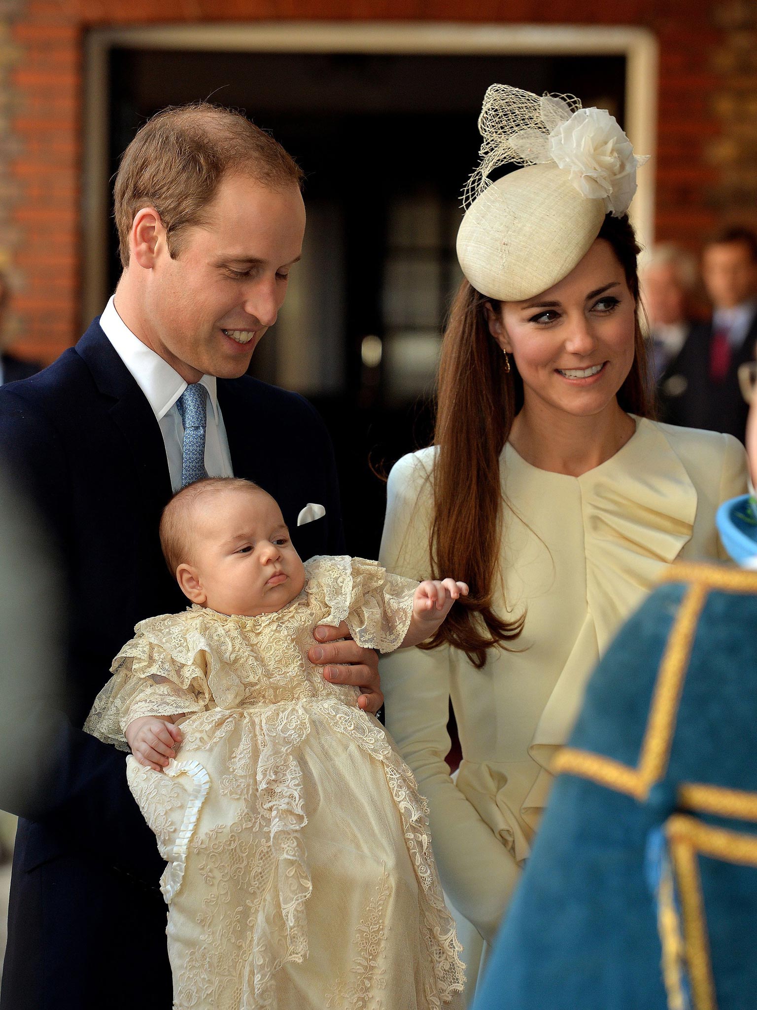 Prince William, Kate Duchess of Cambridge with their son Prince George arrive at Chapel Royal in St James's Palace for the christening of the three month-old Prince George