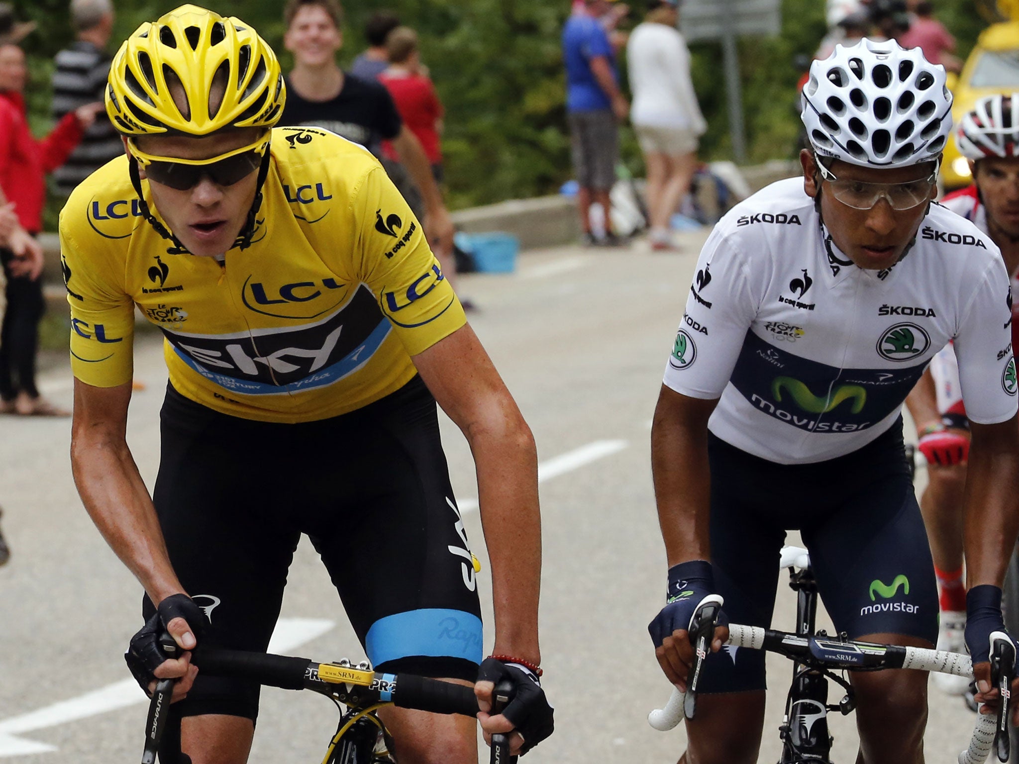 Christopher Froome rides next to best young's white jersey Colombia's Nairo Quintana