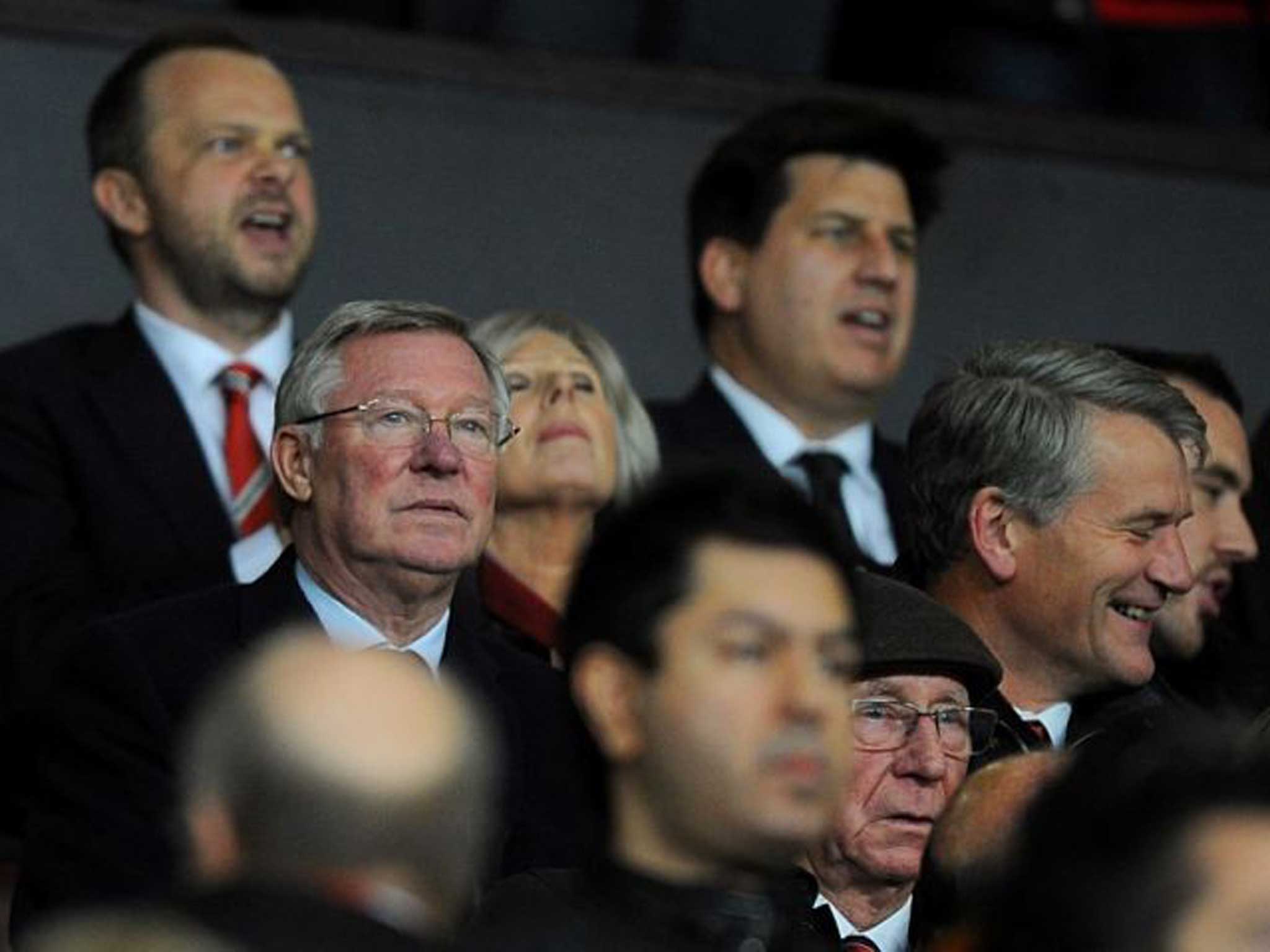 Sir Alex Ferguson looks on from the Old Trafford stands last night