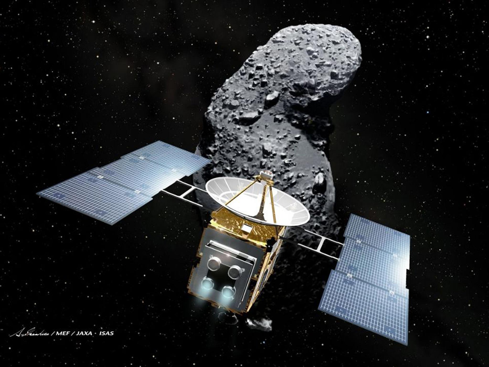 An illustration of Japan's space probe 'Hayabusa' (Falcon) and an asteroid, called Itokawa in the space. The Hayabusa, the first spacecraft to bring home raw material from an asteroid, is to release a canister expected to contain asteroid dust near the Earth