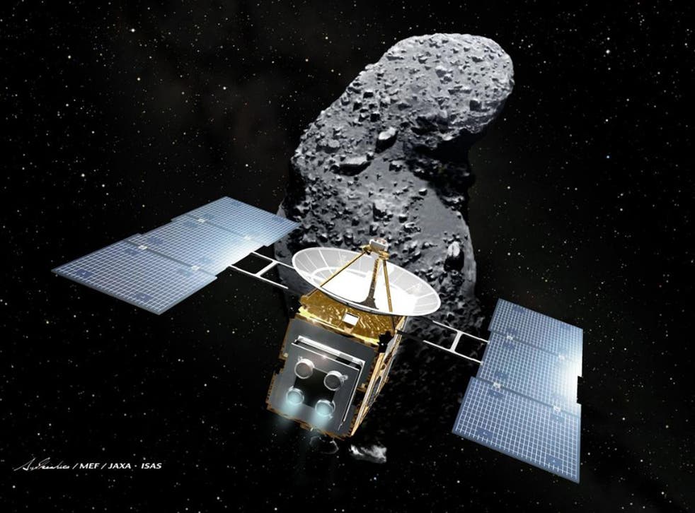 An illustration of Japan's space probe 'Hayabusa' (Falcon) and an asteroid, called Itokawa in the space. The Hayabusa, the first spacecraft to bring home raw material from an asteroid, is to release a canister expected to contain asteroid dust near the Ea