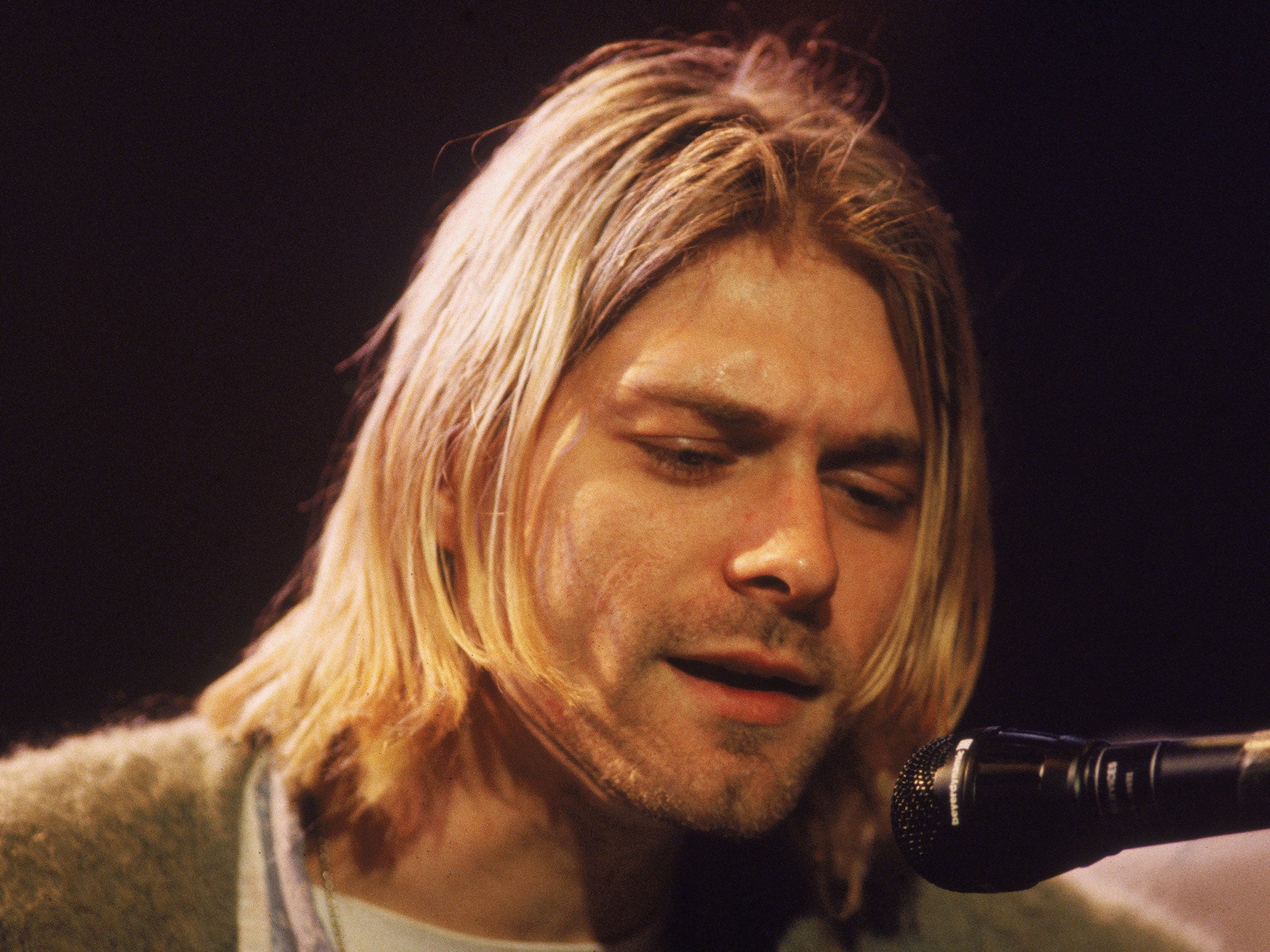 Kurt Cobain, seen here performing for an MTV Unplugged special in 1993, thought he was gay as a teenager, a newly unearthed interview has revealed