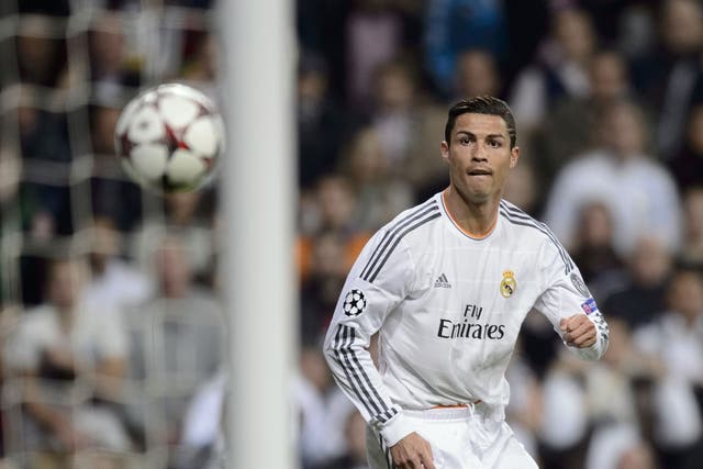 Real Madrid's Portuguese forward Cristiano Ronaldo scores