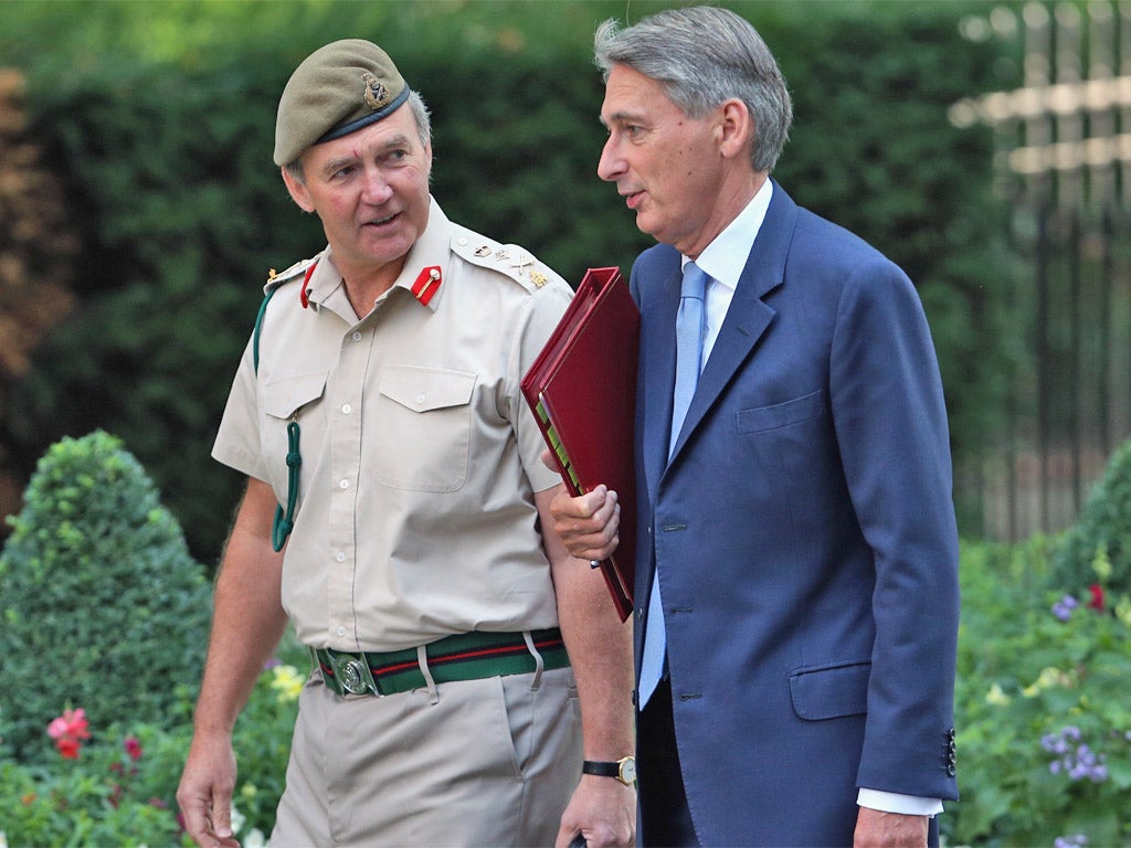 Chief of Defence Staff Sir Nick Houghton and Defence Secretary Philip Hammond (Getty)