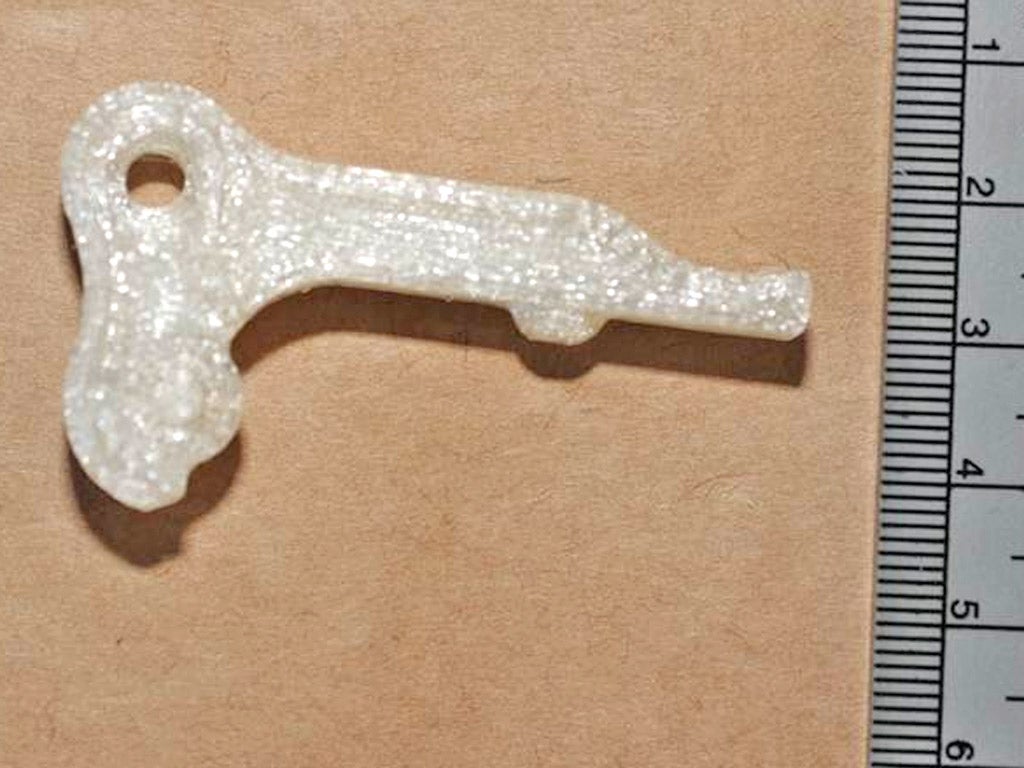 The 3D printer was used to make a gun, trigger (pictured) and cartridge