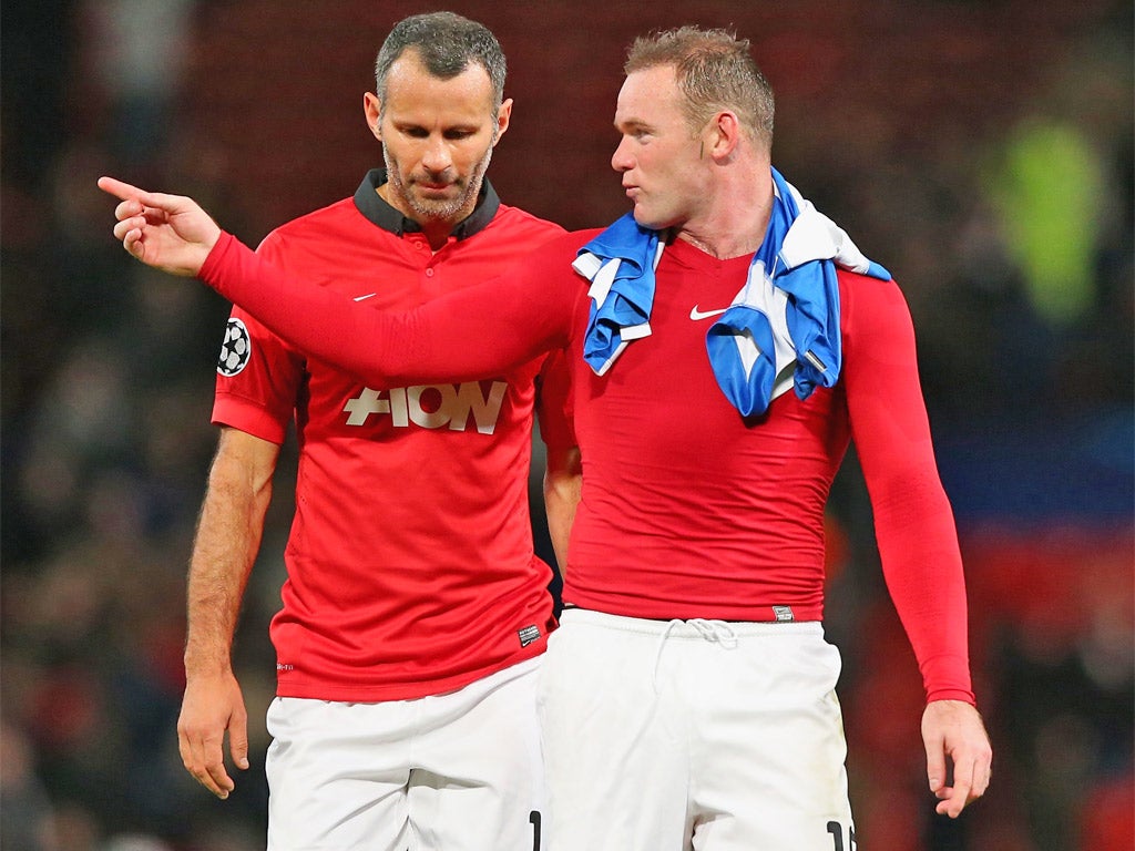 Wayne Rooney (right) chats to Ryan Giggs after Wednesday’s win