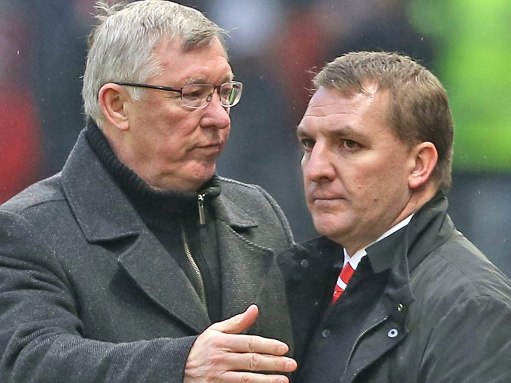 Ferguson and Rodgers on the touchline during an encounter between Manchester United and Liverpool last season