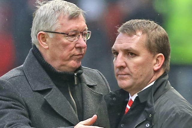Ferguson and Rodgers on the touchline during an encounter between Manchester United and Liverpool last season