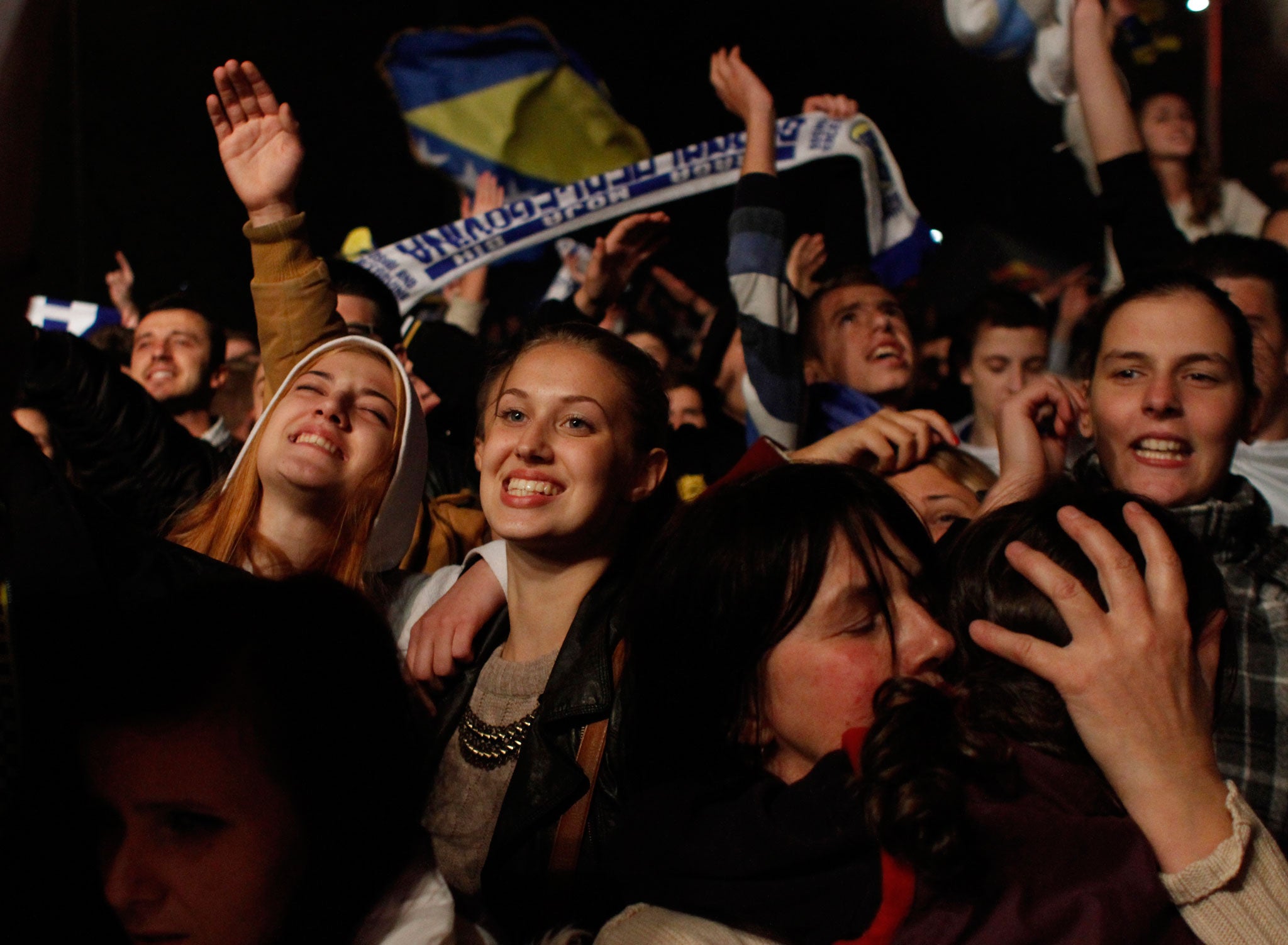 Bosnian fans celebrating their team's qualification for the World Cup in Brazil