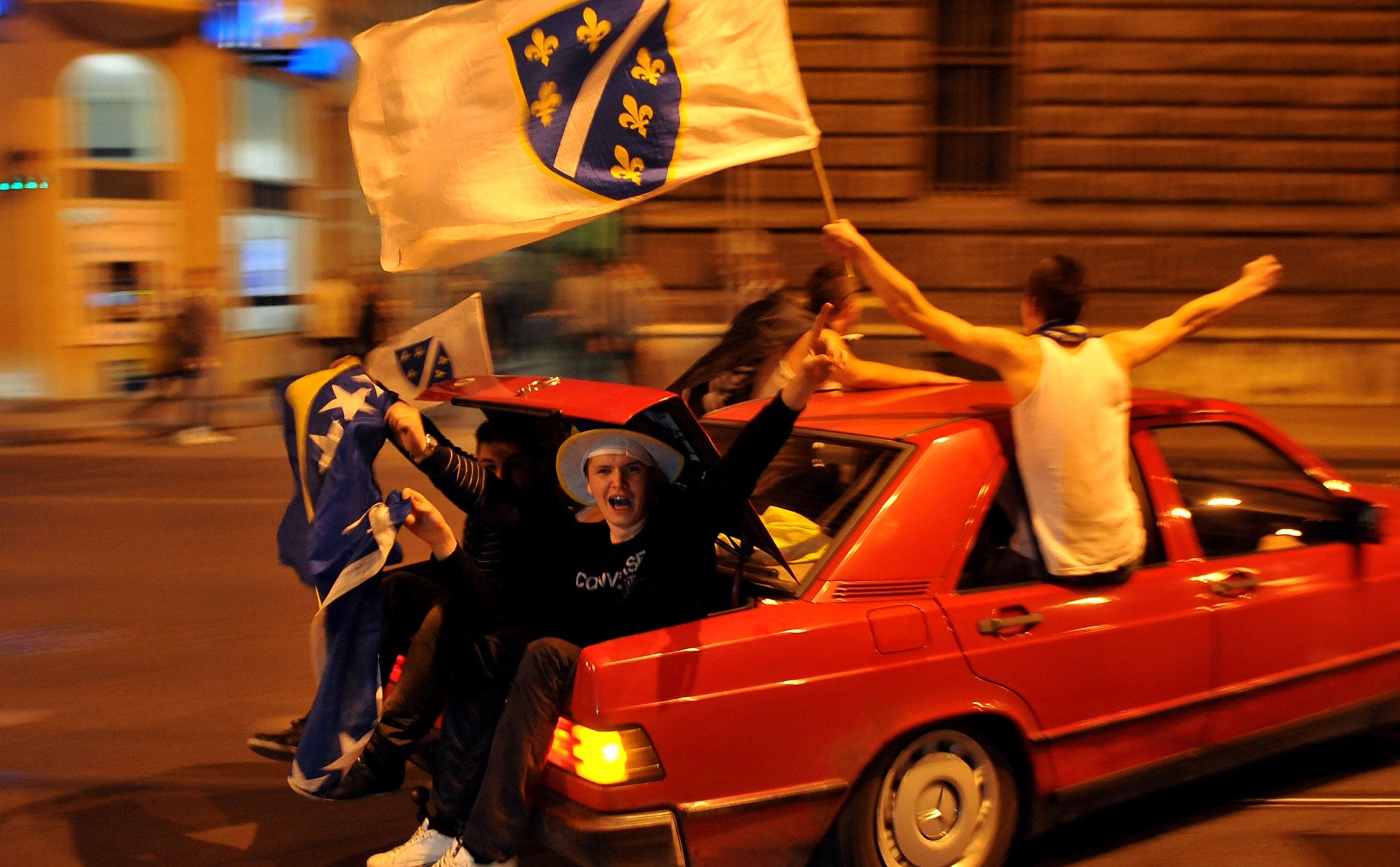 Bosnian fans celebrating their team's qualification for the World Cup in Brazil