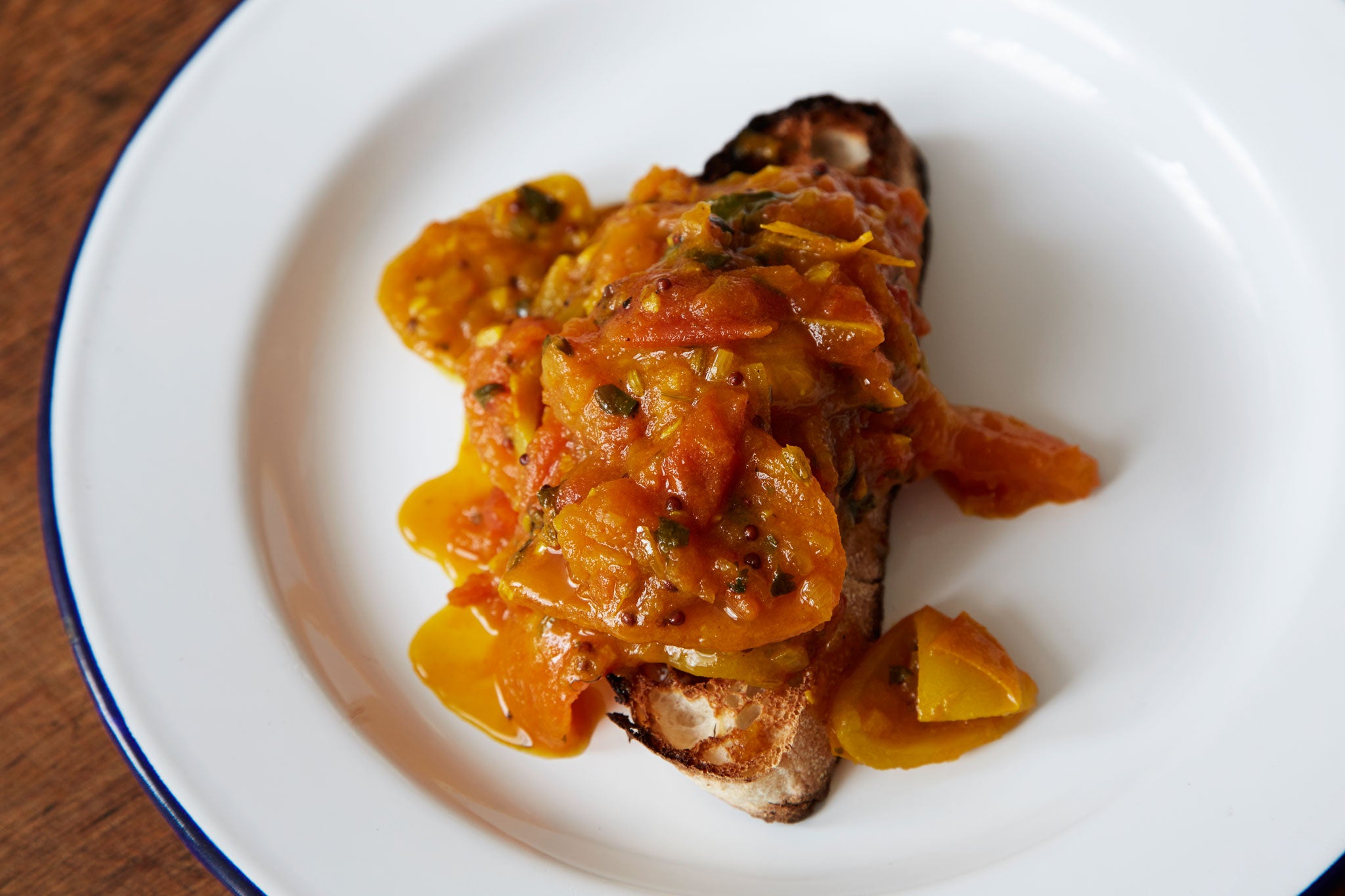 Curried tomatoes on toast will certainly wake you up when you have an early weekend brunch