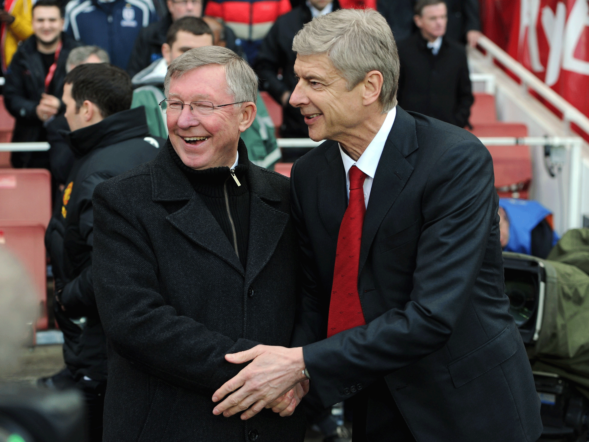Arsene Wenger the Manager of Arsenal and Alex Ferguson the Manager of Manchester United shake hands