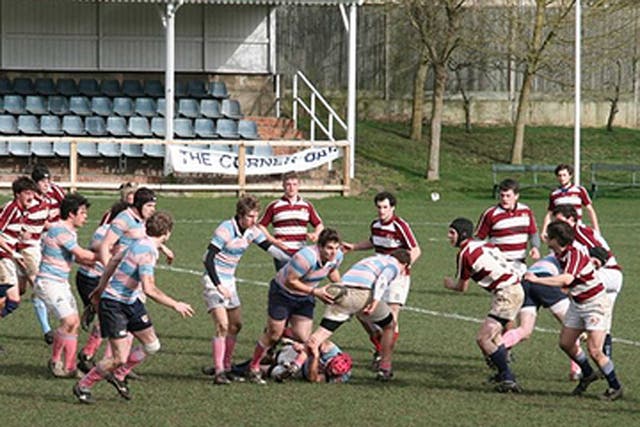A historic image of Pembroke College's rugby player's in action, from Rugby Football Club's homepage