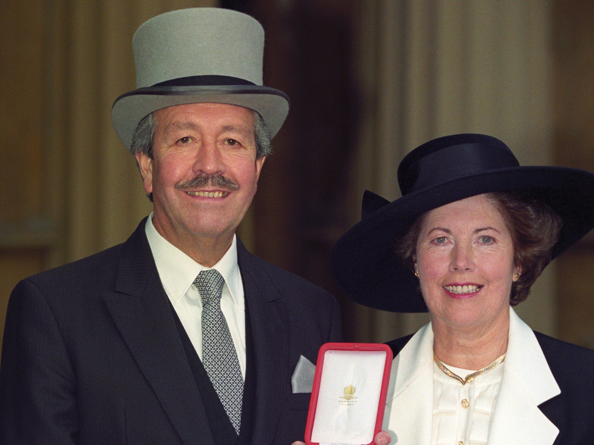 Sir Gil Thompson, pictured with his wife, Dorothy, was knighted in 1993, having transformed civil aviation in the North