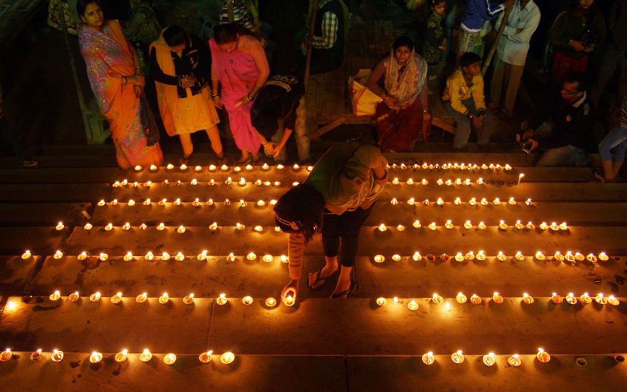 Hindus mark the festival of lights but the country is held back by slowing growth and deficits