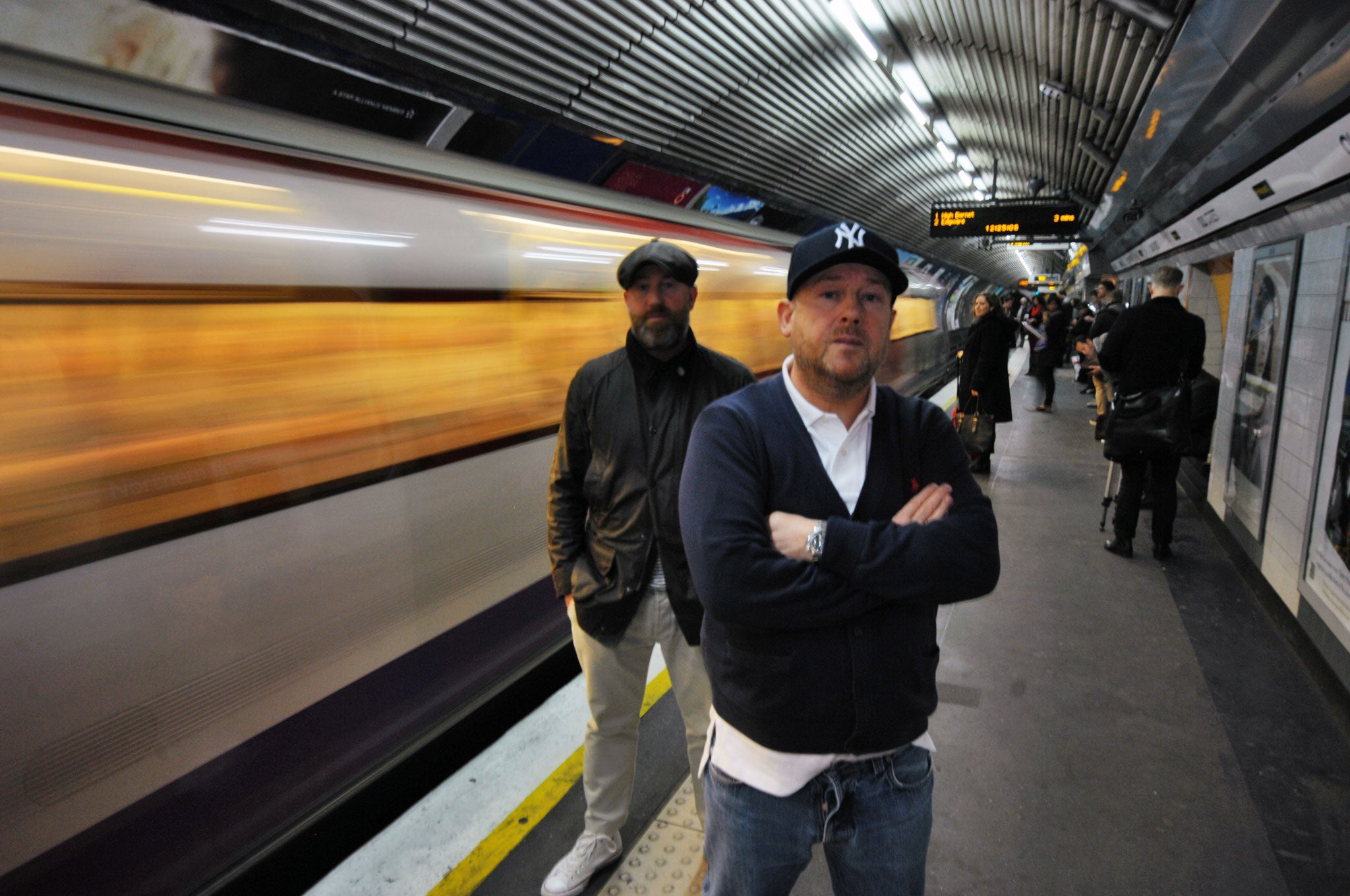 The brothers, with Anthony in a baseball cap