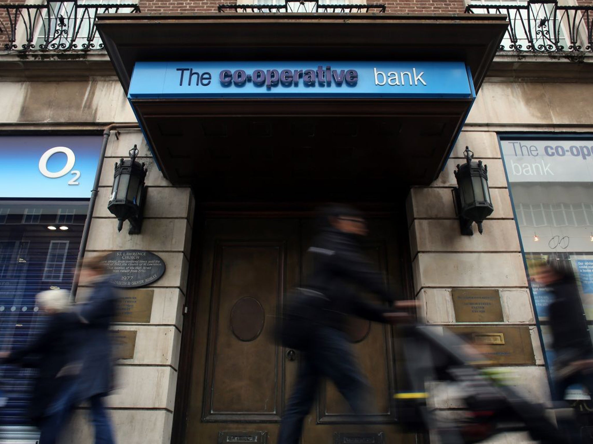 The Co-operative Group has confirmed that it will hand control of its troubled banking arm to a group of powerful investors