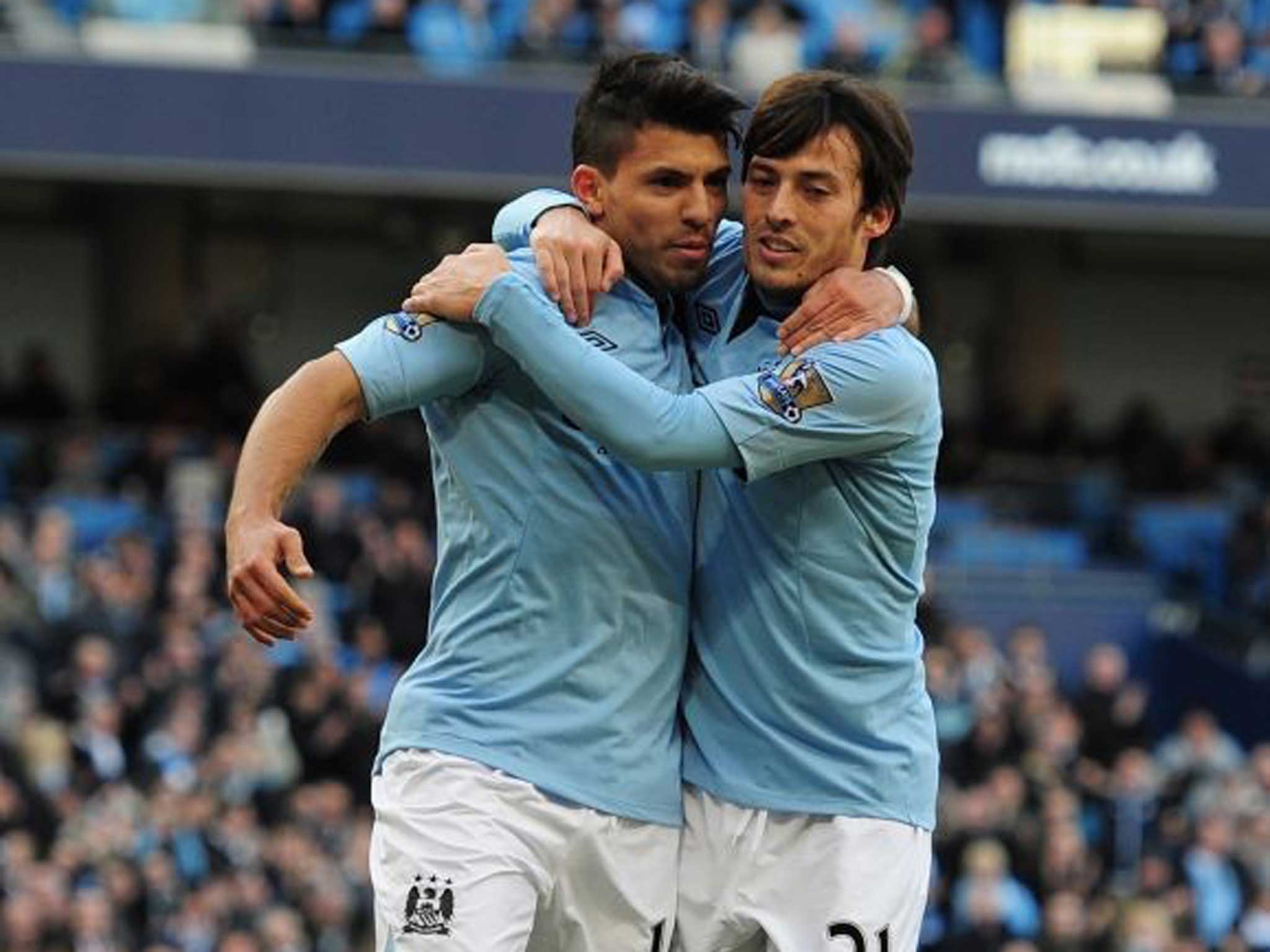 Tight bond: Aguero (left) and Silva have formed a sound understanding