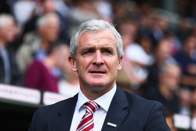 Mark Hughes looks on from the touchline