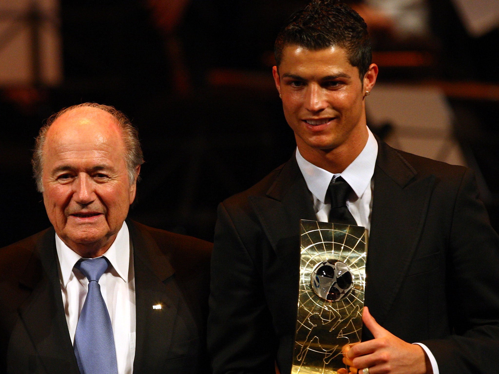Sepp Blatter (left) poses with Cristiano Ronaldo in January 2009 when he won the Fifa World Player of the Year award for 2008