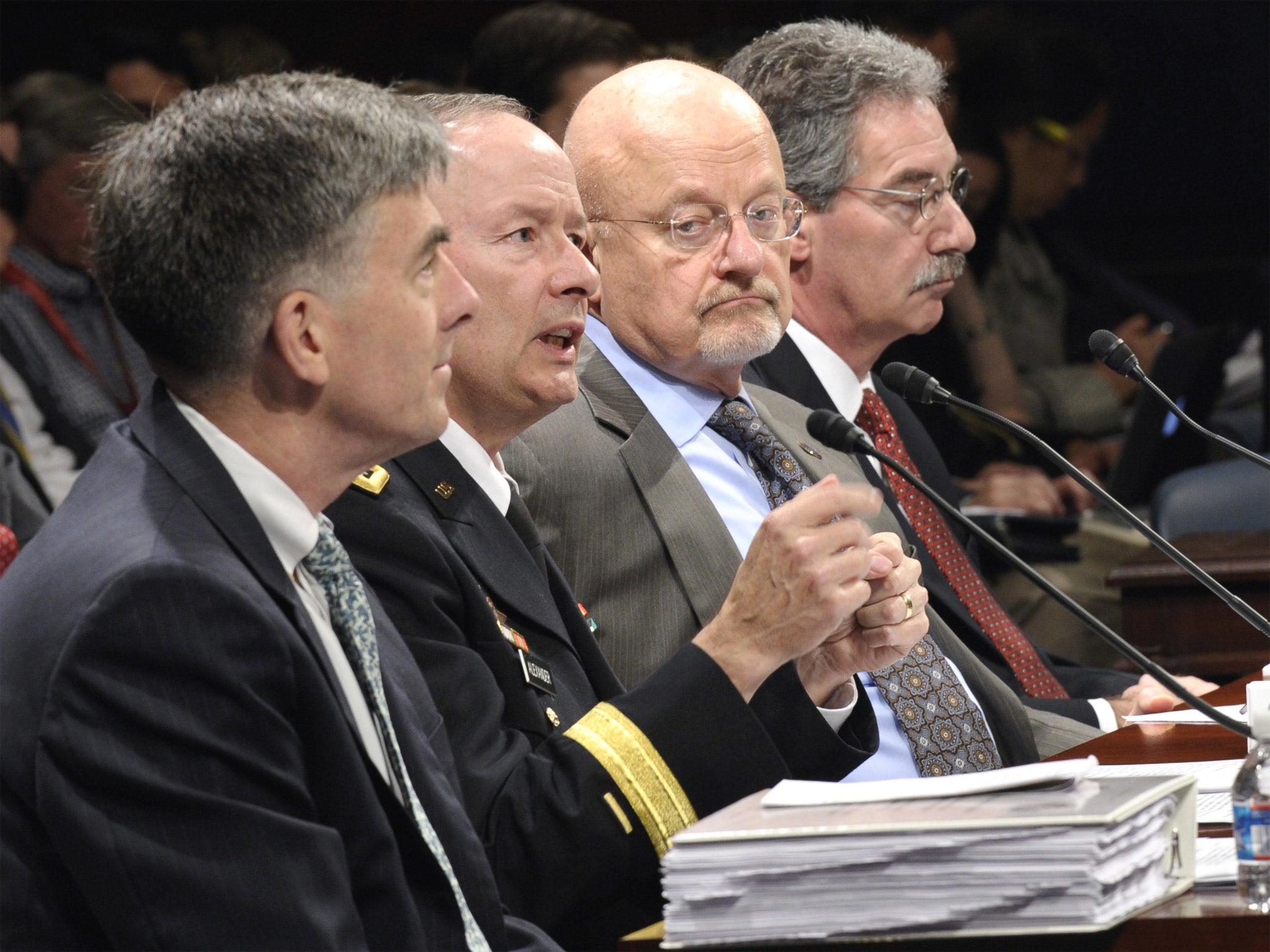 From left: National Security Agency Deputy Director Chris Inglis, National Security Agency Director Gen. Keith Alexander, Director of National Intelligence James Clapper and Deputy Attorney General James Cole, testify on Capitol Hill in Washington before