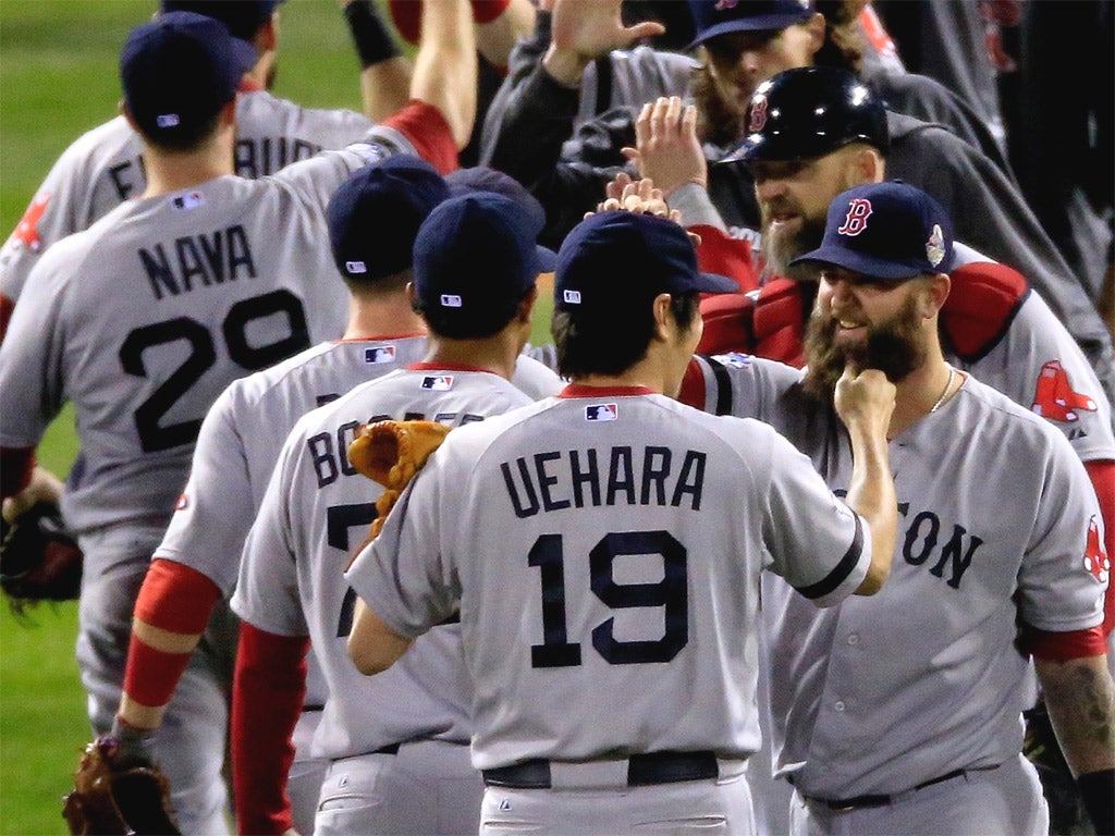 The bearded Boston Red Sox players celebrate victory in Game Five of the World Series