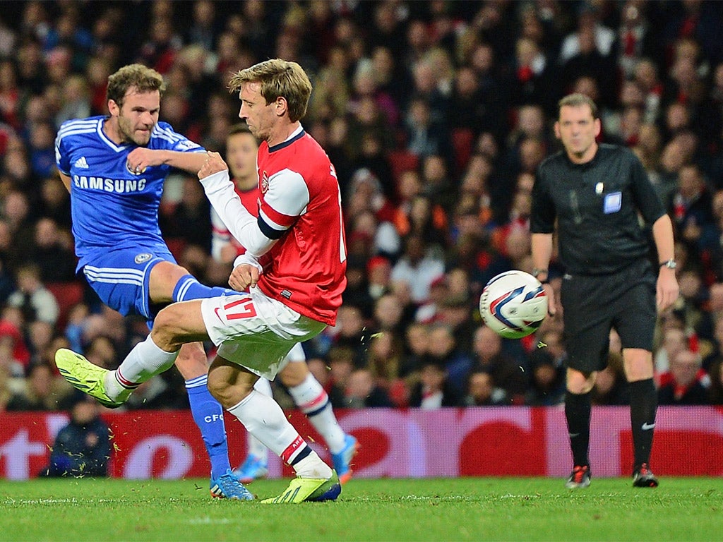 Juan Mata strikes Chelsea’s second goal past Nacho Monreal