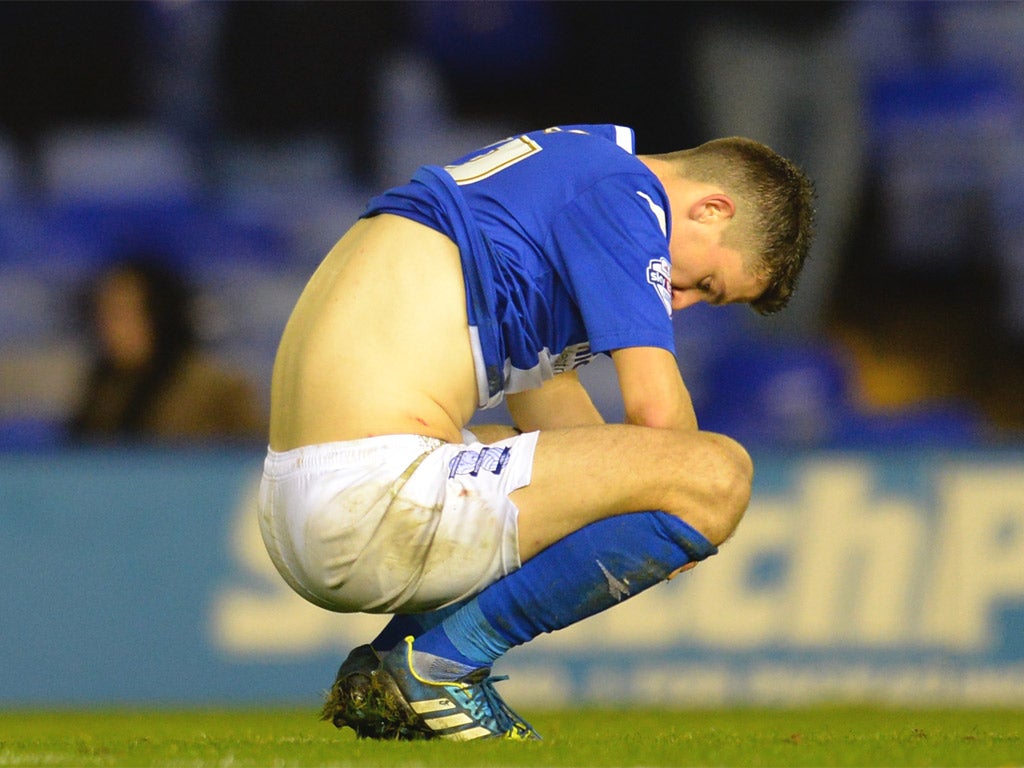 A dejected Callum Reilly of Birmingham City after missing a penalty