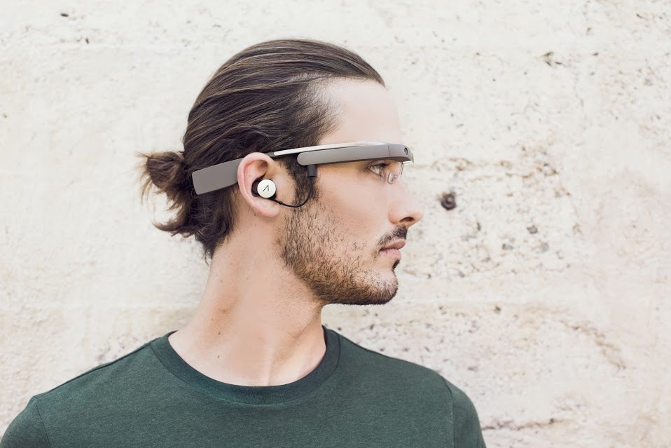 A man wears the updated Google Glass device.