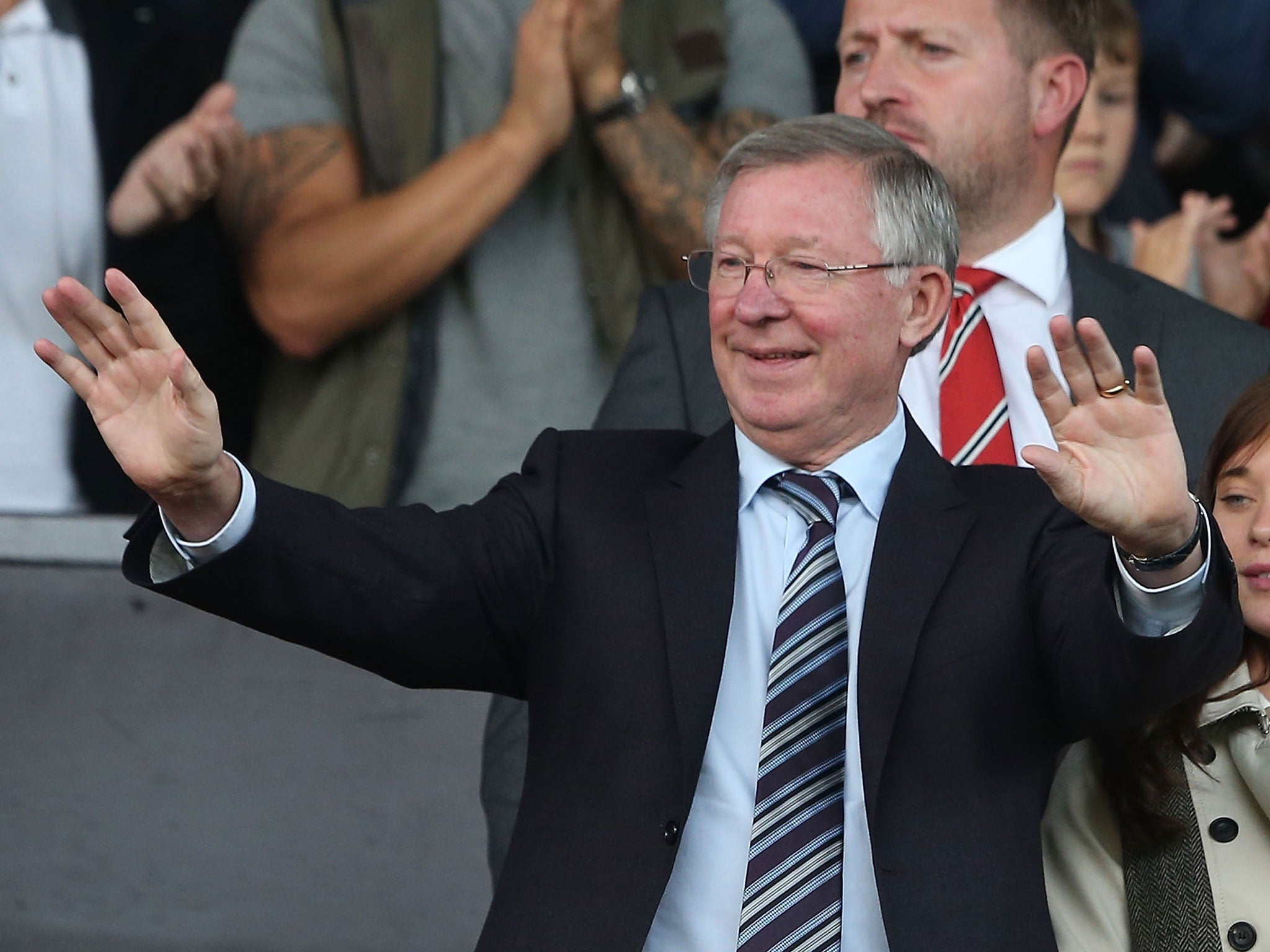 Former Manchester United manager Sir Alex Ferguson watches from the directors' box