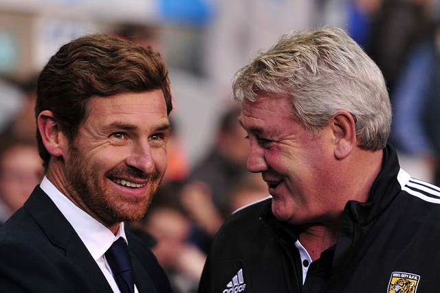Tottenham Hotspur's Portuguese manager Andre Villas-Boas greets Hull City's English manager Steve Bruce