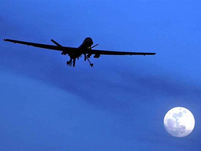 A US Predator drone flies over Kandahar Air Field, southern Afghanistan